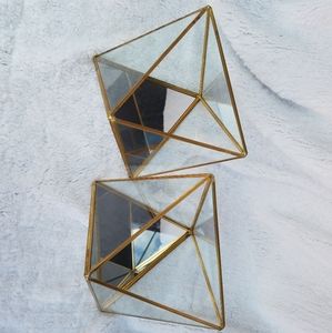 2 gold framed geometric diamond candle holders